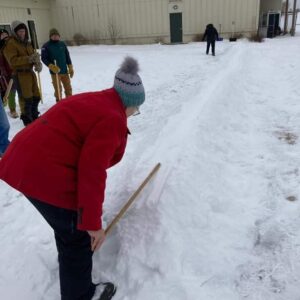 Throwing a snowsnake.
