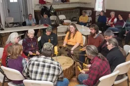 Drumming after the snow snake games.