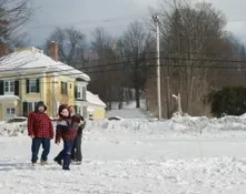 Playing snow snake games.