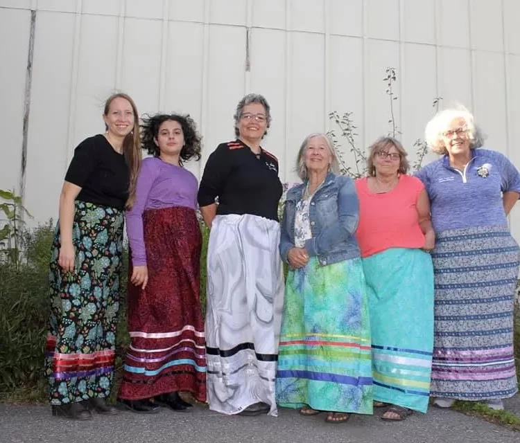 Six beautiful skirts on six beautiful ladies.