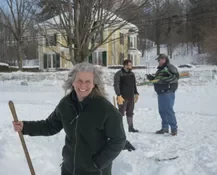 Playing snow snake games.