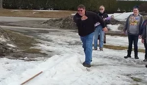 Playing snow snake games.