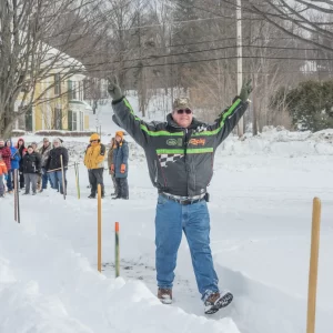 Celebrating winning the snowsnake game!