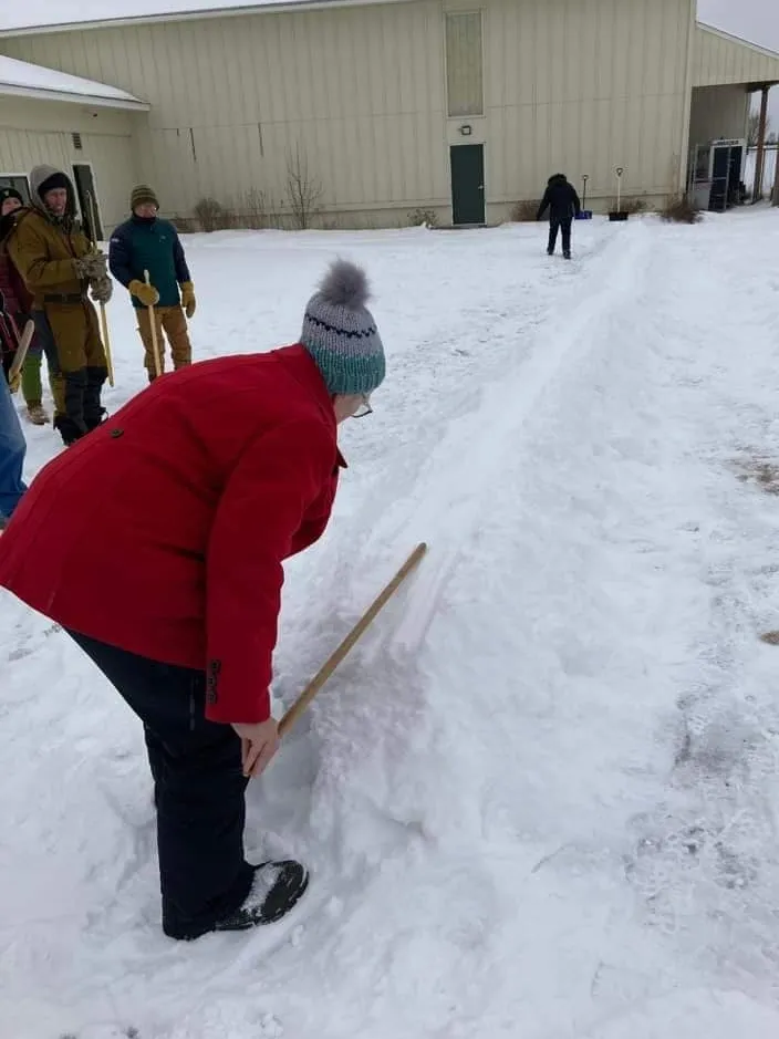 Playing a snow snake game
